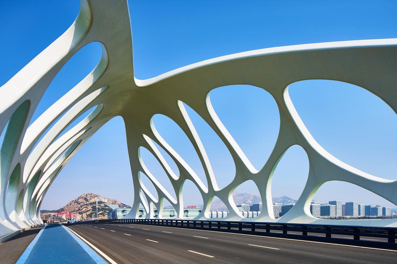 Отель Wanda Vista Qingdao Movie Metropolis Экстерьер фото