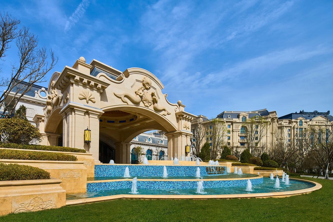 Отель Wanda Vista Qingdao Movie Metropolis Экстерьер фото